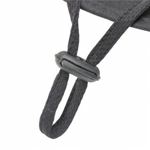 Adjustable black strap detail for sun hat with plastic buckle cord lock for secure fit.