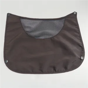 Outdoor sun hat shawl detail, brown fabric with breathable mesh and snap buttons for protection.