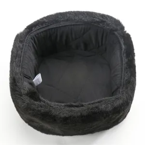 Detailed view of the black winter plush fur hat interior, showcasing quilted lining and tag.
