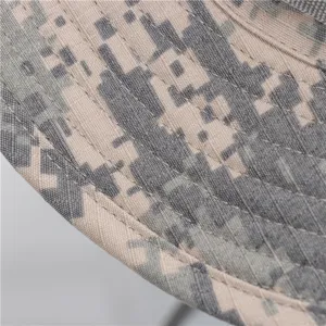 Close-up detail of unisex camouflage bucket hat fabric and precise stitching for outdoor hiking.