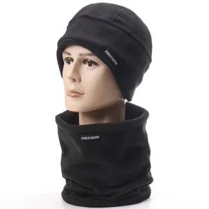 Detail view of the black fleece winter thermal beanie hat and neck warmer set, soft fabric.