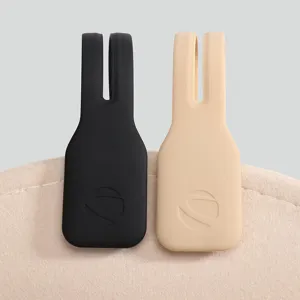 Silicone magnetic hat clip for outdoor travel, portable sun protection hat holder in dual colors.