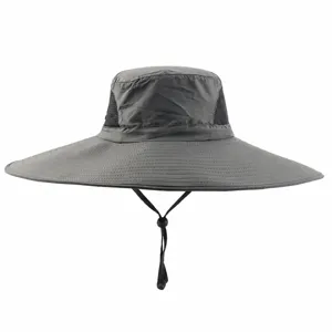 Grey outdoor sun protection bucket hat with 15cm wide brim and breathable mesh design.
