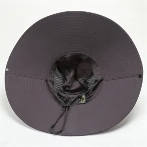 Detailed view of the wide brim sun hat, mesh lining and adjustable chin cord for outdoor.