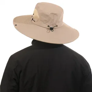 Detailed view of the khaki sun hat showing the adjustable back toggle and breathable side mesh.