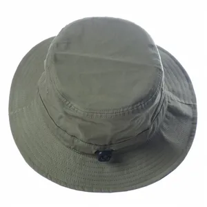 Detailed view of the army green bucket hat showcasing the adjustable cord and wide brim.
