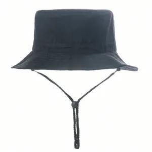 Black bucket hat detail showing adjustable chin strap and brim texture for sunny days.