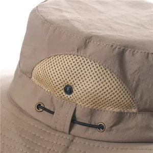 Close-up of khaki outdoor sun hat with breathable mesh ventilation and adjustable cord strap.
