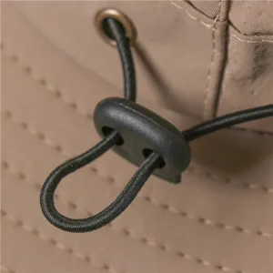 Outdoor hiking sun hat detail featuring adjustable elastic drawcord and durable cord lock for secure fit.