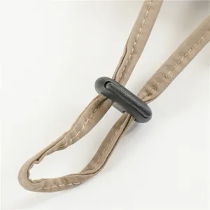 Adjustable drawstring and cord lock detail of outdoor sun hat, durable material, khaki color.