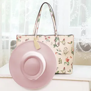Portable rubber magnetic hat clip for travel, outdoor sun hat holder and bag accessory.