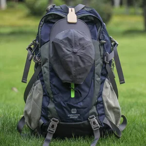Portable magnetic hat clip for outdoor travel, convenient backpack accessory for sun hats.