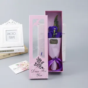 Detail view of a pink gift box containing a 3-rose soap flower bouquet for Valentine Day.