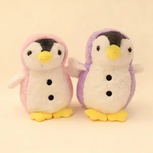 Cute transformable penguin plush toy detail, soft stuffed animal doll for kids, charming room decor.