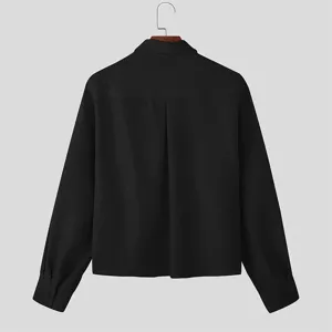 Men's black casual long sleeve shirt detail view showcasing texture and back pleat design.