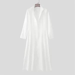White men's long coat detail view showing the elegant standing lapel and A-line swing design.