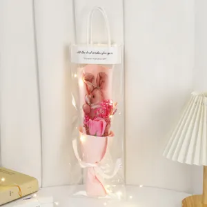 Plush rabbit bouquet gift bag with dried flowers and LED lights for romantic occasions.
