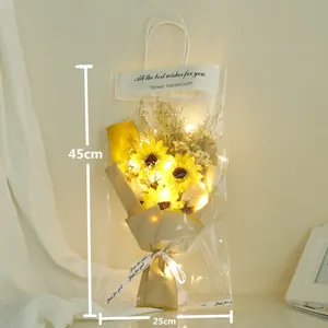 LED sunflower dried flower bouquet gift bag in transparent packaging for birthday and Valentine.