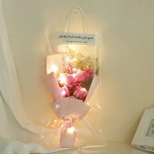 Romantic LED rose bouquet in transparent gift bag perfect for Valentine Day birthday.
