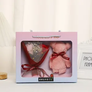 Detail view of the romantic rose soap flower and cute towel bear gift box packaging.