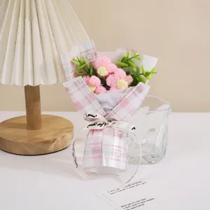 Handmade crochet mini flower bouquet with pink plaid wrapping paper and cute greeting card.