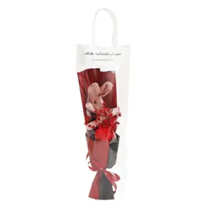 Valentine gift bunny rabbit doll dried flower bouquet in transparent handbag for lover.