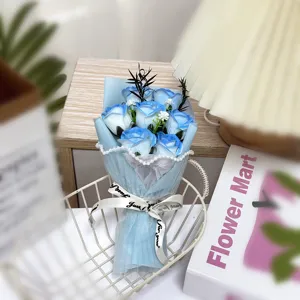 Blue soap rose bouquet detail, exquisite mesh wrapping and decorative ribbon for romantic gifts.