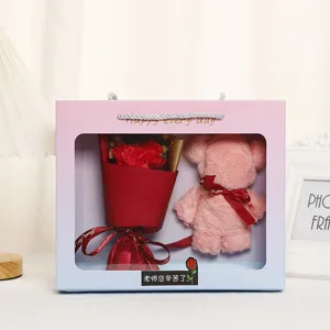 Gift box detail featuring soap flower bouquet and pink towel bear for special day