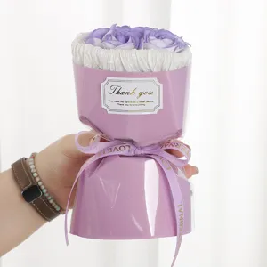 Close-up of the delicate purple soap rose bouquet detail, featuring elegant wrapping and ribbon.