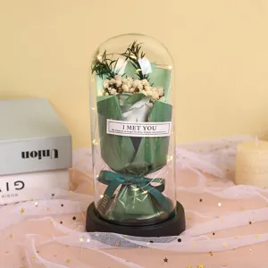 Glass dome soap rose flower bouquet gift, green variant with warm LED fairy lights for lovers.