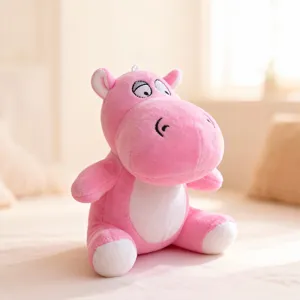 Pink plush hippo toy, soft stuffed animal doll, cute claw machine gift for kids and home decor.