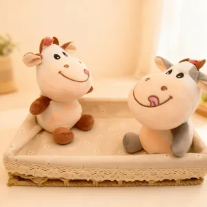 Close-up detail of cute plush cow toys sitting in a cozy woven basket, soft and fluffy.