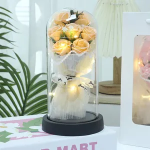Eternal rose soap flower bouquet in glass dome with LED lights for romantic gift detail.