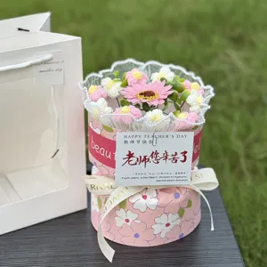 Handmade crochet flower bouquet gift box, cute pink floral arrangement for desk decor.