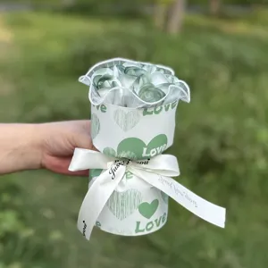 Green soap rose bouquet gift for valentine day, romantic heart wrapped floral present.