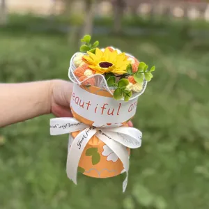 Detailed view of the handmade knitted sunflower bouquet, elegant gift packaging design.