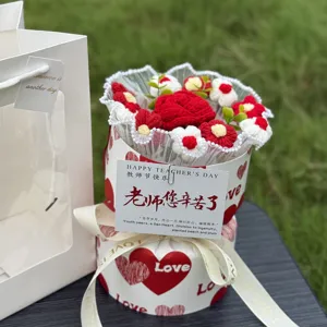 Handcrafted crochet rose flower bouquet gift box with heart pattern packaging for special occasions.
