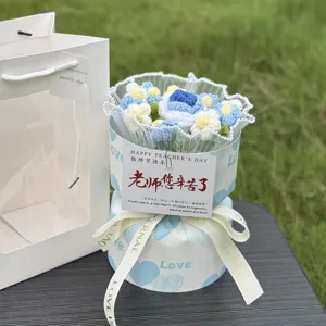 Handmade crochet rose flower bouquet gift box with greeting card and gift bag for lovers.