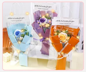 Handmade crochet flower bouquet with gift bag and LED lights, perfect romantic gift for Valentine's Day.