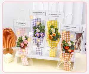 Handmade knitted crochet flower bouquet with gift bag and LED lights for romantic gift.