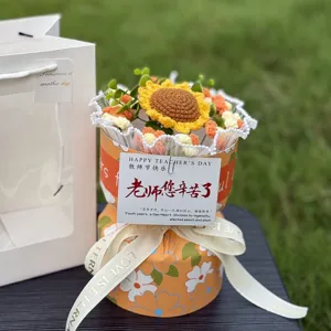 Handmade crochet sunflower bouquet gift box with greeting card and matching gift bag.
