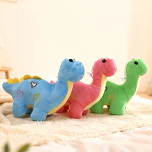 Cute cartoon dinosaur plush toys set with heart embroidery and suction cup for window hanging.