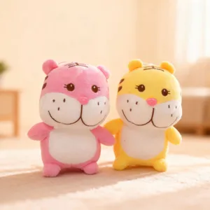 Detailed view of cute cartoon tiger plush dolls in pink and yellow with soft fabric.