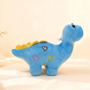 Cute blue dinosaur plush toy featuring yellow back scales and sweet heart embroidery design.