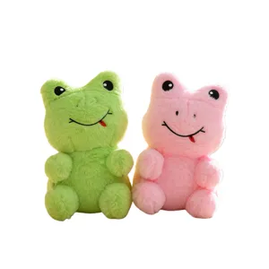 Lindo peluche de rana animal de juguete, verde y rosa muñeca sentada para regalos infantiles.