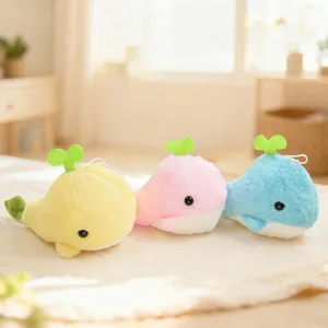 Cute plush whale toy with green sprout pendant soft stuffed animal doll for kids decor