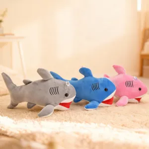 Cute soft plush shark toy detail shot, showing vibrant colors and suction cup design clearly.