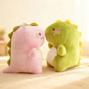 Cute soft dinosaur plush toy detail showing pink and green stuffed animals close up nicely.