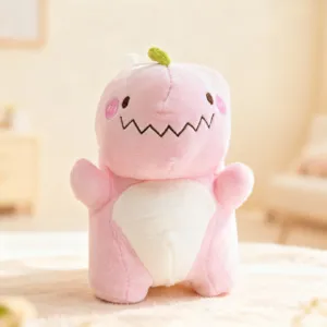 Cute pink dinosaur plush toy detail view, soft fabric and delicate embroidery design.