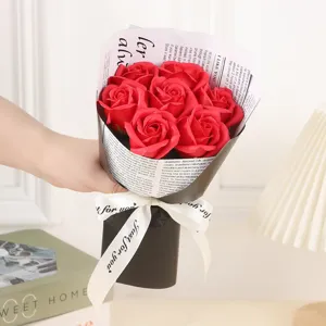Handmade red soap rose bouquet wrapped in stylish newspaper paper, perfect gift for Valentine's Day.